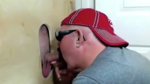 penis Hungry whore engulfing appealing rods In A Gloryhole